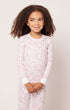 Model wearing Kid's Pima Snug Fit Pajama Set in Dorset Floral .